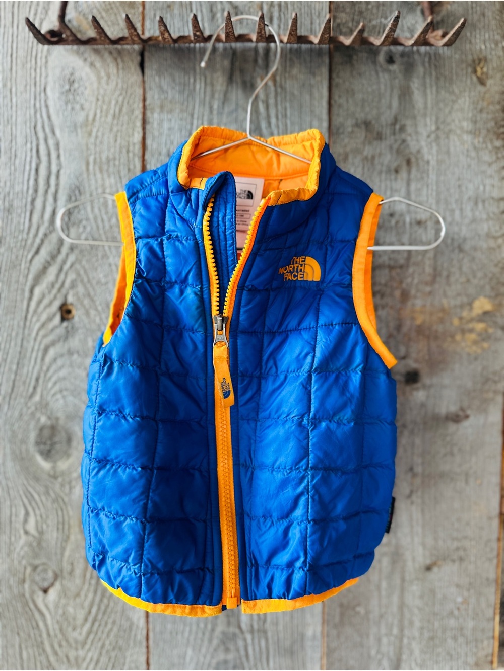 12-18 mo - The North Face Blue Vest with Orange Trim